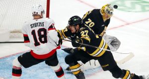 Senadores caem para o aumento dos Bruins na prorrogação