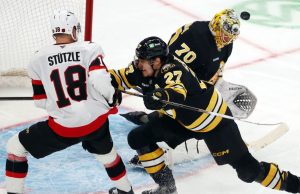 Senadores caem para o aumento dos Bruins na prorrogação